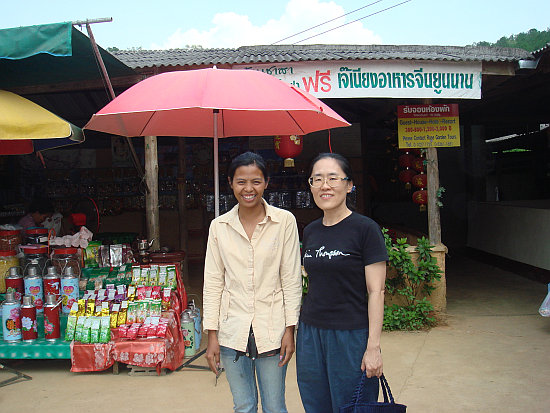 With the multilingual hill tribe lady at Ban Rak Thai